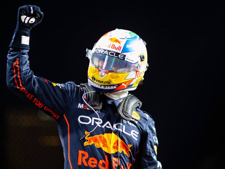 JEDDAH, SAUDI ARABIA - MARCH 26:  Pole position qualifier Sergio Perez of Mexico and Oracle Red Bull Racing celebrates in parc ferme after qualifying ahead of the F1 Grand Prix of Saudi Arabia at the Jeddah Corniche Circuit on March 26, 2022 in Jeddah, Saudi Arabia. (Photo by Dan Istitene - Formula 1/Formula 1 via Getty Images)